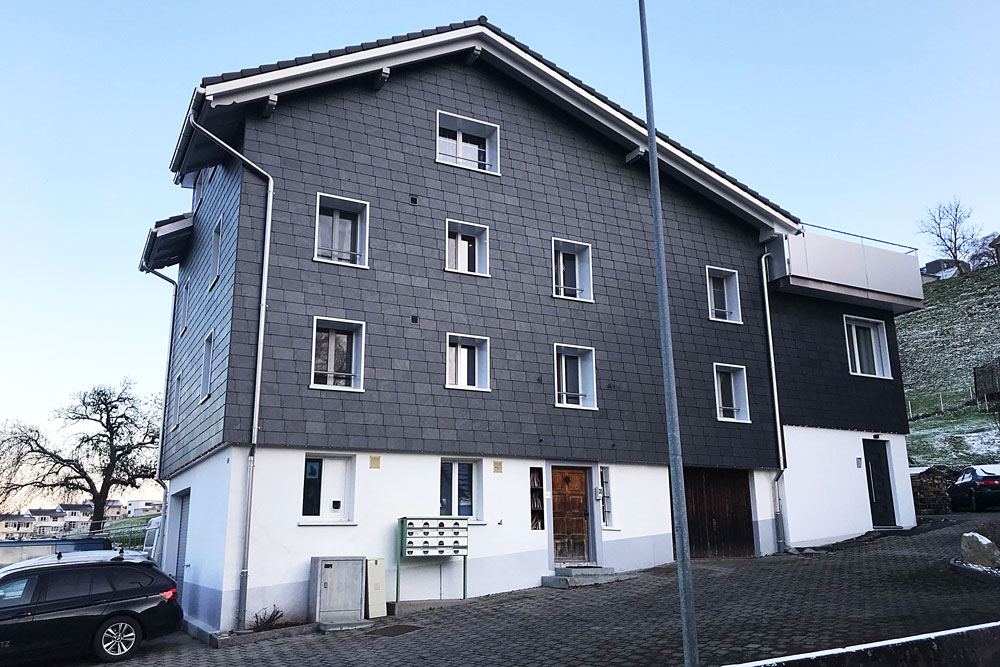 Anbau und Sanierung Mehrfamilienhaus